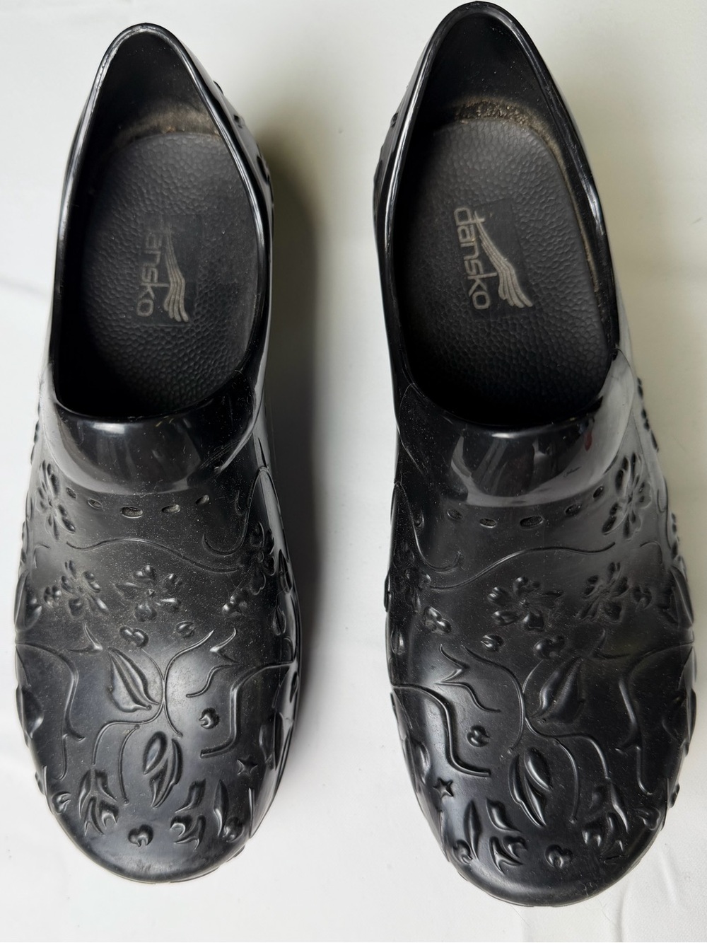 Dansko Black Floral Embossed Slip-On Clogs - Comfort and Style size 6